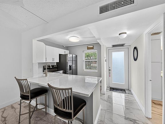 5th image of 9351 Lime Bay Boulevard #212