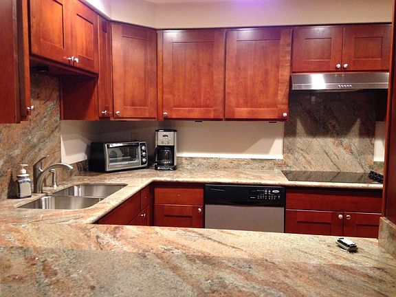 granite counter top. stainless steel appliances
