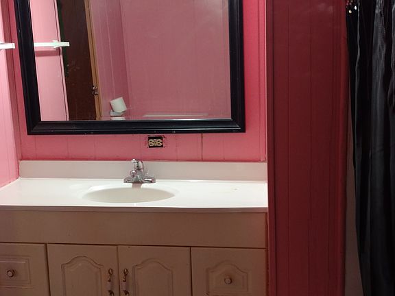 One of the bathrooms/ You may paint it a different color