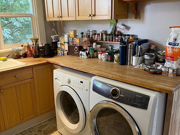 Washer dryer in kitchen area