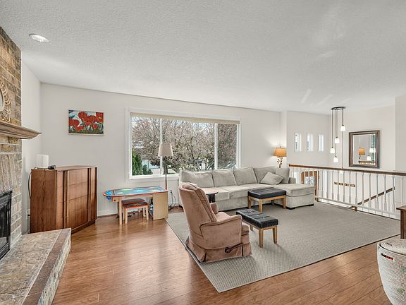 The split entry leads upwards to a large living room with beautiful views from the large front window.