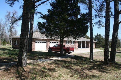 view of home showing walk to outdoor patio