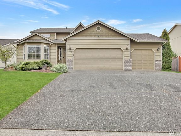 3 car garage and ample driveway parking!