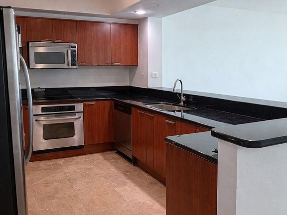 2nd image of 14951 Royal Oaks Lane #1607