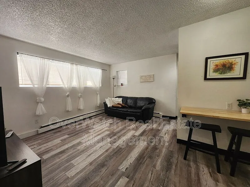 Building Photo - 3007 W 33rd Ave #1