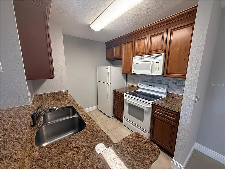 8932 Manor Loop #205 — Photo 14
