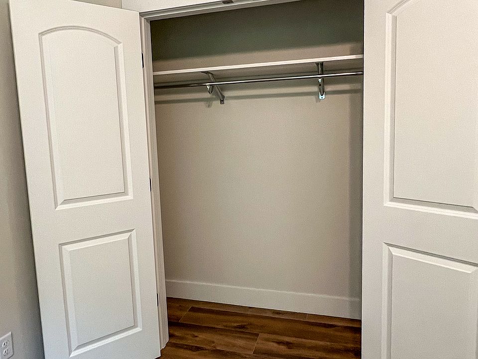 Closet with upgraded shelving and rod