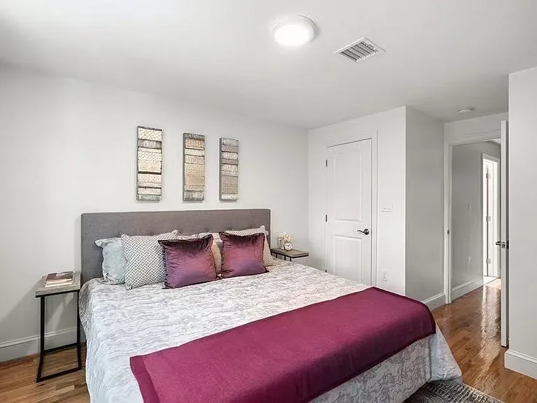 Bedroom with big window, walk-in closet, central air AC.