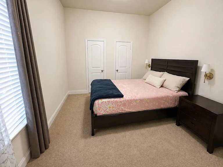 guest bedroom - downstairs with attached bath