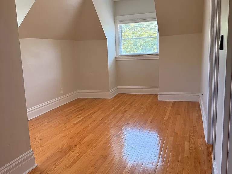 Apartment entrance and living room.