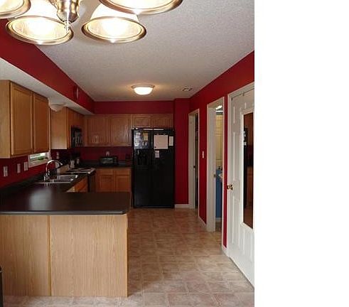 view of kitchen from breakfast room.