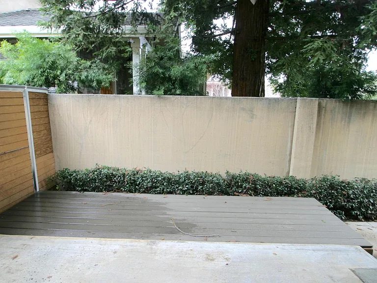 Private yard with elevated deck