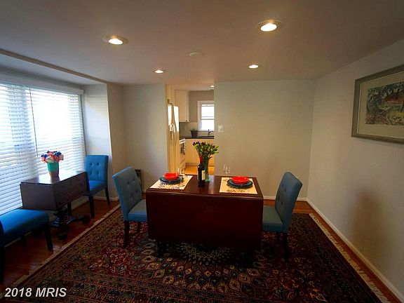 Natural light flows through the bay window