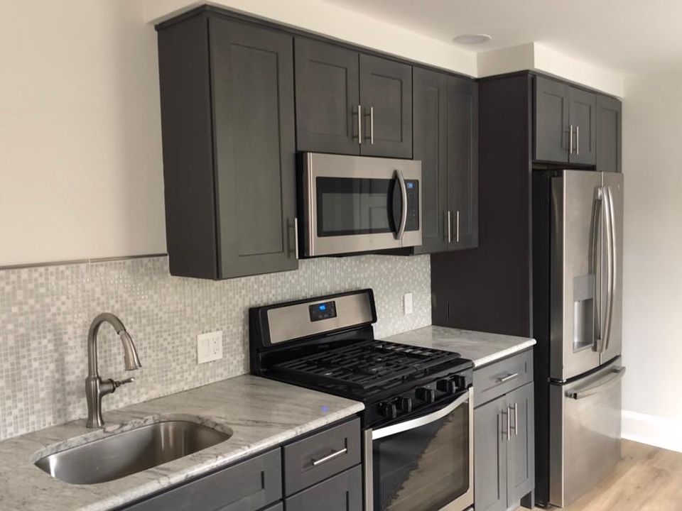 new cabinets / appliances - DW , gas stove , micro , icemaker
