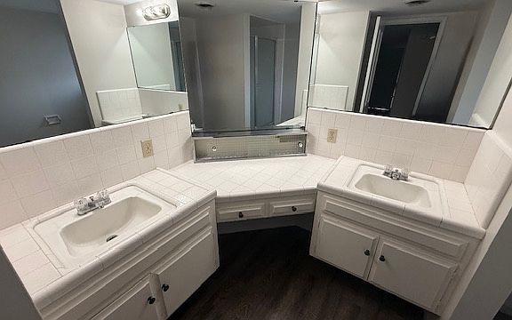 Bathroom with double sinks and vanity