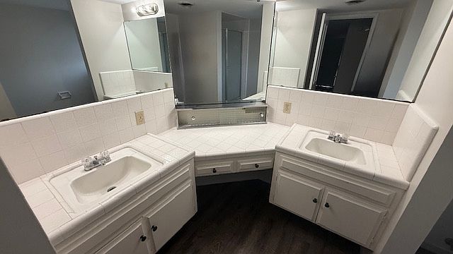Bathroom with double sinks and vanity