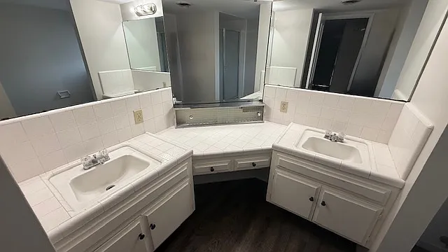 Bathroom with double sinks and vanity