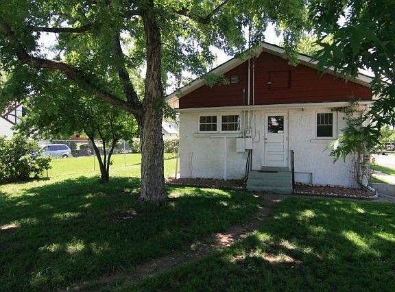 Fenced Backyard with Large Shade Trees