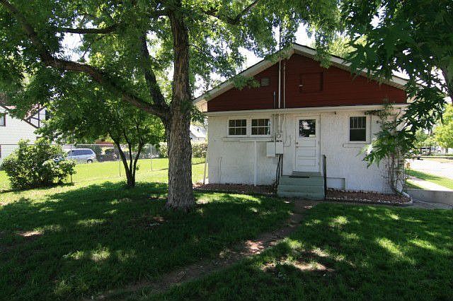 Fenced Backyard with Large Shade Trees