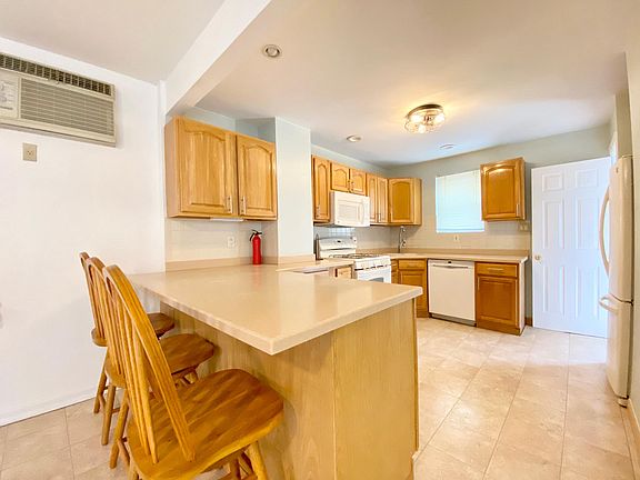 2nd image of 65-12 79th Pl Floor 1