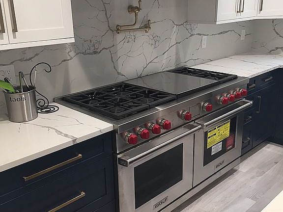 Pot filler over 60” Wolfe 