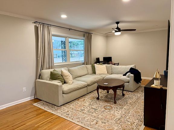Living room from dining room and kitchen entry