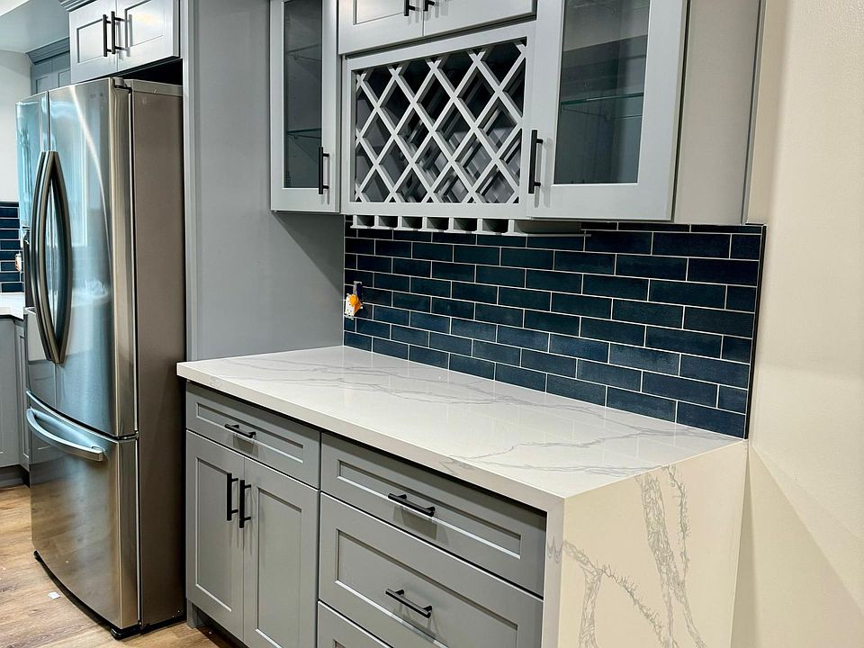 Quartz countertops with "waterfall" edge.