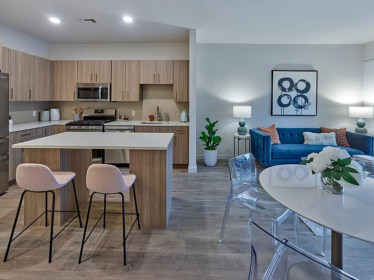 Explore the elegance of this chic apartment, blending open spaces with stylish design.