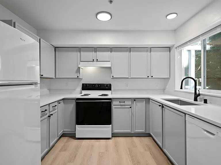 2-bedroom apartments have updated kitchens and decks or patios 2-bedroom apartments have updated kitchens and decks or patios