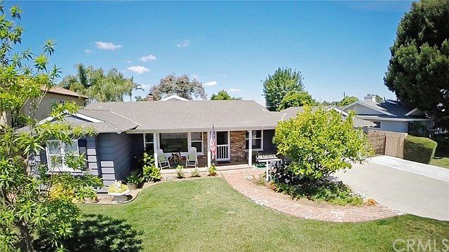 Mid-century ranch home at its finest. Bonus, Satsuma Mandarin orange tree worth its weight in gold with the sweetest fruit.