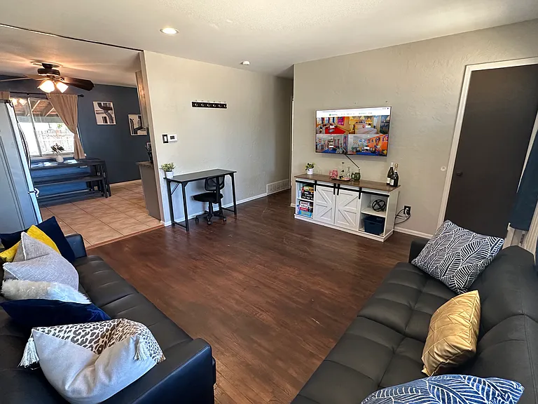 Gather the family in our inviting living room with plush couches and a TV for quality bonding time.