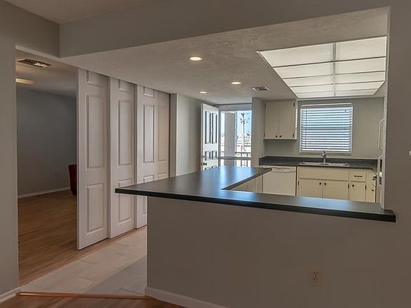 New tile in entry & kitchen, tons of natural light!