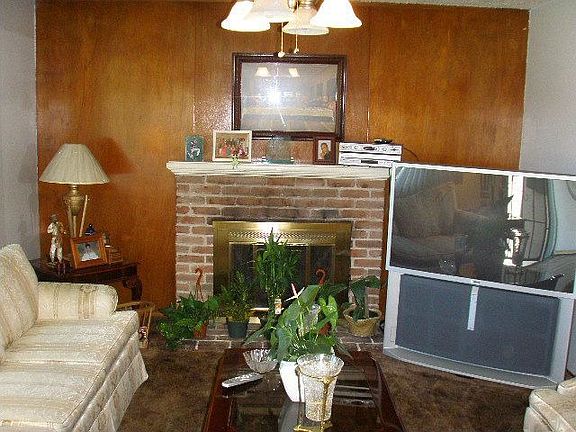 Living Room w/Brick Fireplace