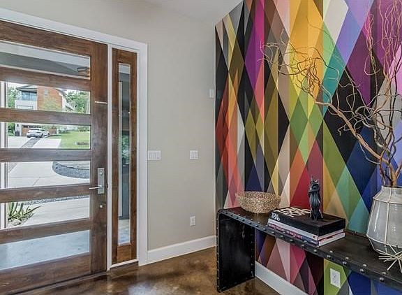 Your view to the neighborhood includes a newer build across the street.