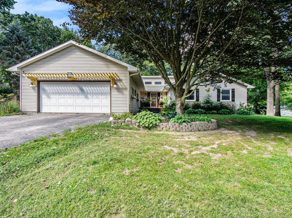 7715 Marquis Dr, Dexter, MI 48130