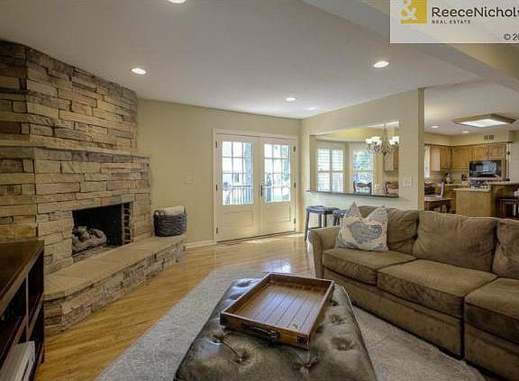 Open floor plan with tons of light and an awesome stacked stone