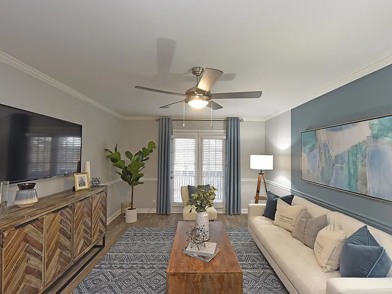 Spacious living room with hardwood-style flooring