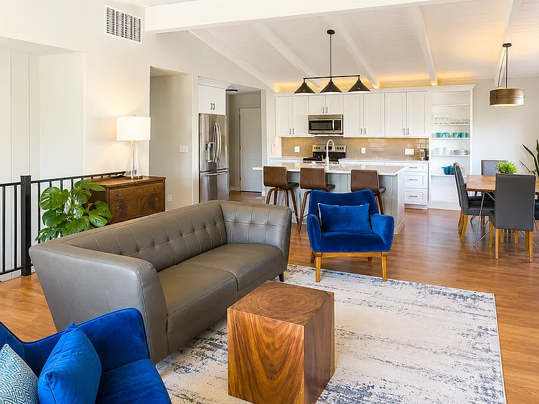 Upstairs Living Room - Gas Fireplace - Open Concept - Updated Kitchen with Quartz Countertops and Stainless Steel Appliances