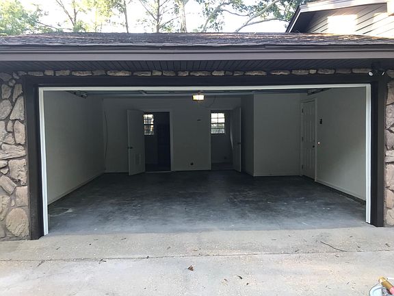Garage with Storage room and Laundry room