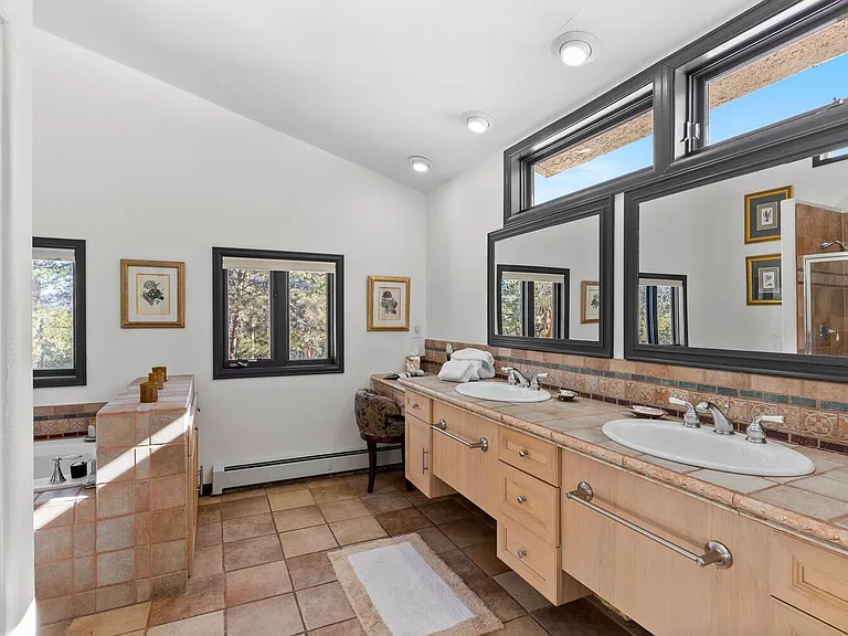 Ensuite master bath with a shower and Jacuzzi Spa Tub