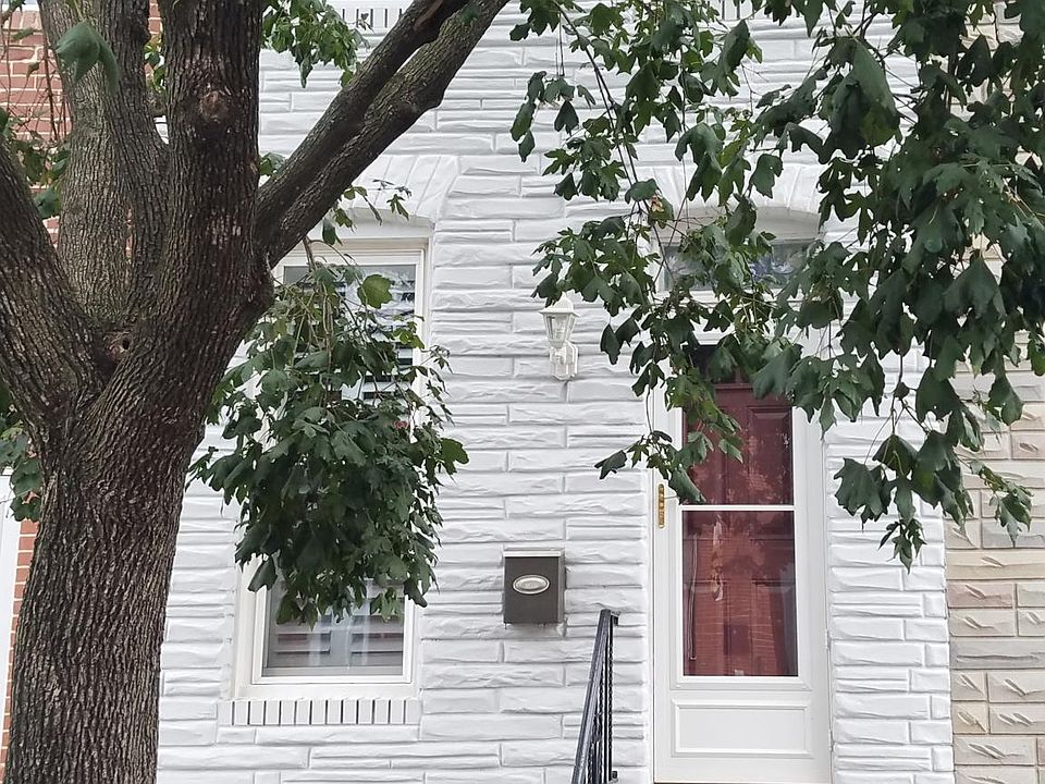 Newly painted exterior near end of the block