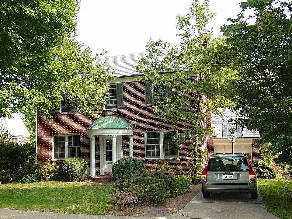 Stately Colonial on Tree-lined Street