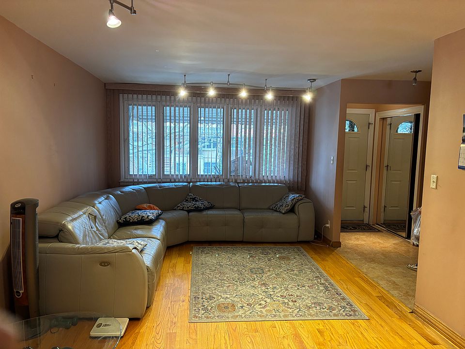 Open Living Room - Right of image Front door and two sliding mirror doors as coat closet