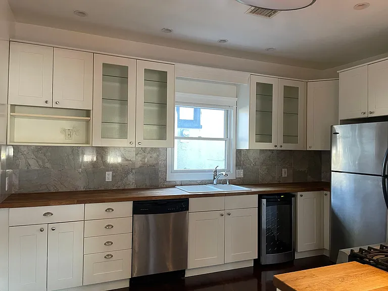 kitchen with dishwasher and wine frig