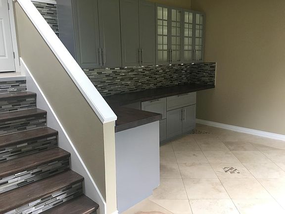 Entry way view of the custom office / bar space