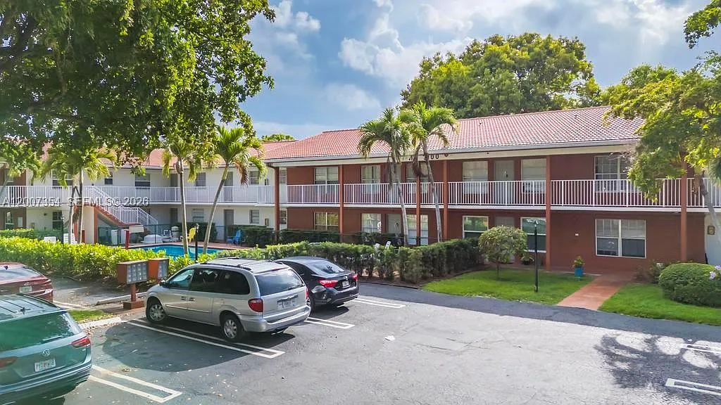 Building Photo - 3100 Coral Springs Dr #2H