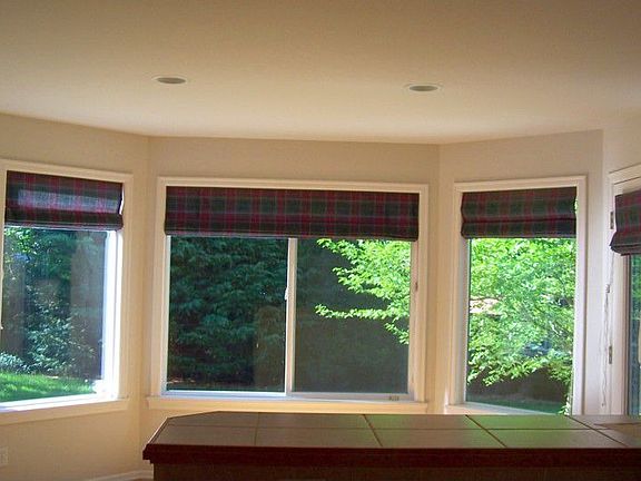 View from kitchen. Surround windows in eating area.