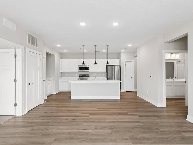 Large kitchen and living area of an apartment home at Tiffany Flats.