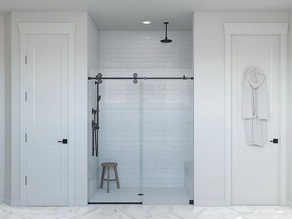 Primary bath with glass shower enclosure