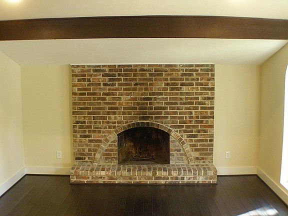 Nice wood floors and cozy fire place